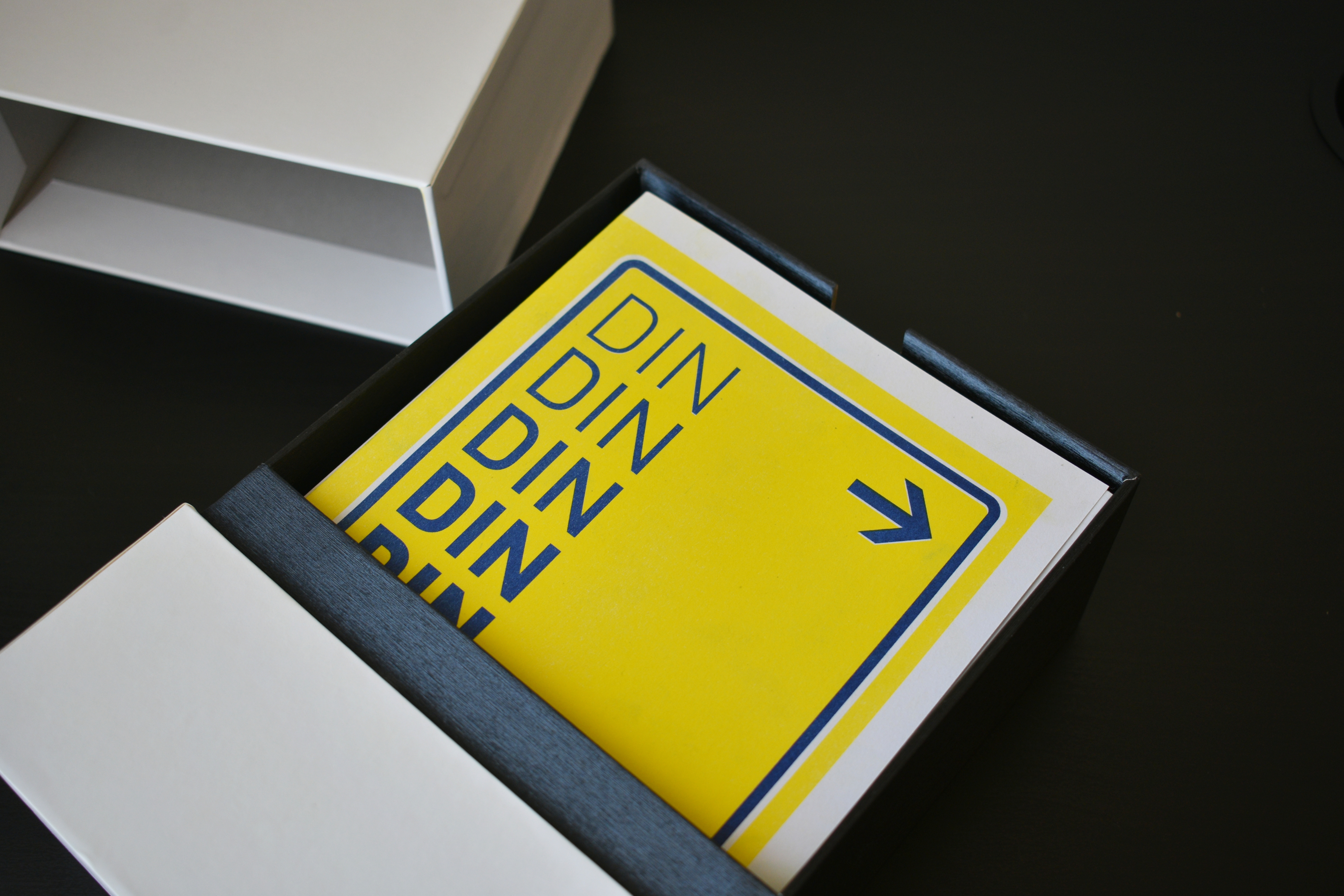 Anders brand wordmark in white placed on top of an image of a modern interior design.