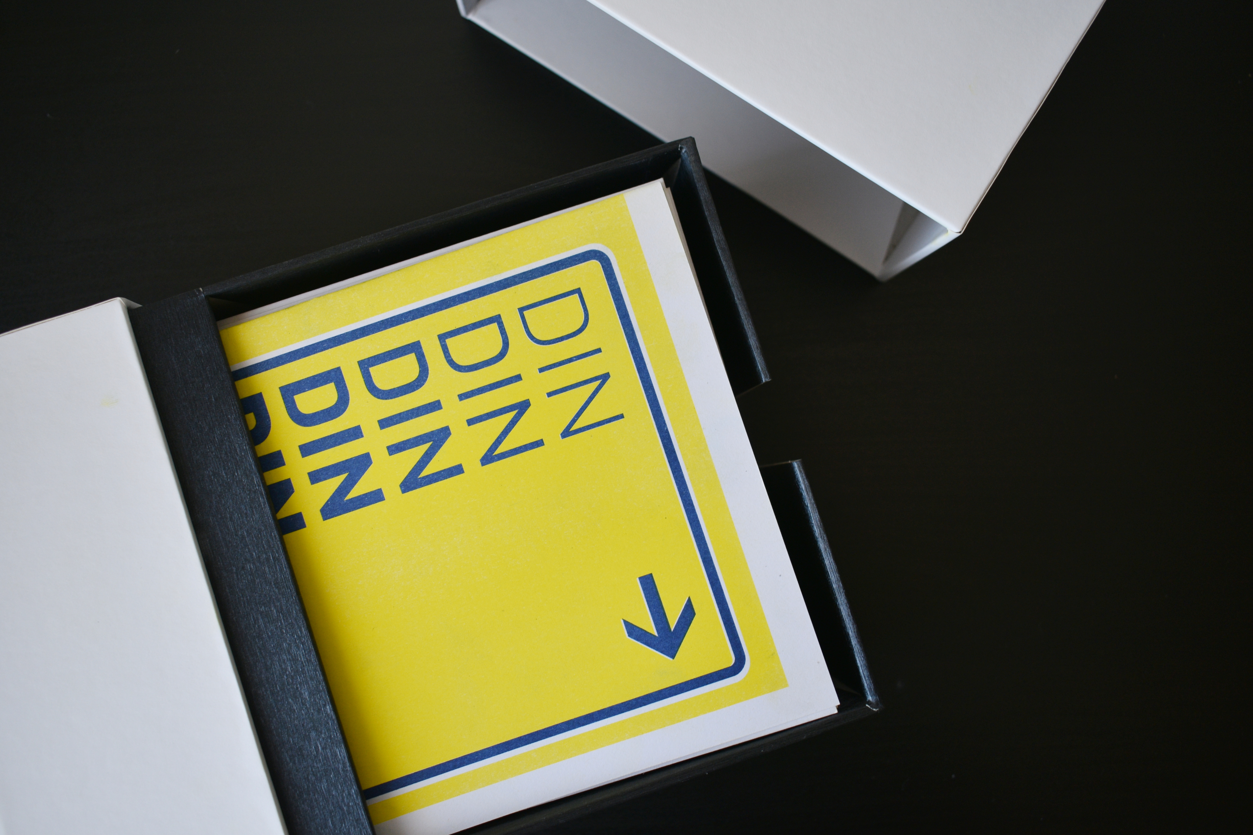 Anders brand wordmark in white placed on top of an image of a modern interior design.