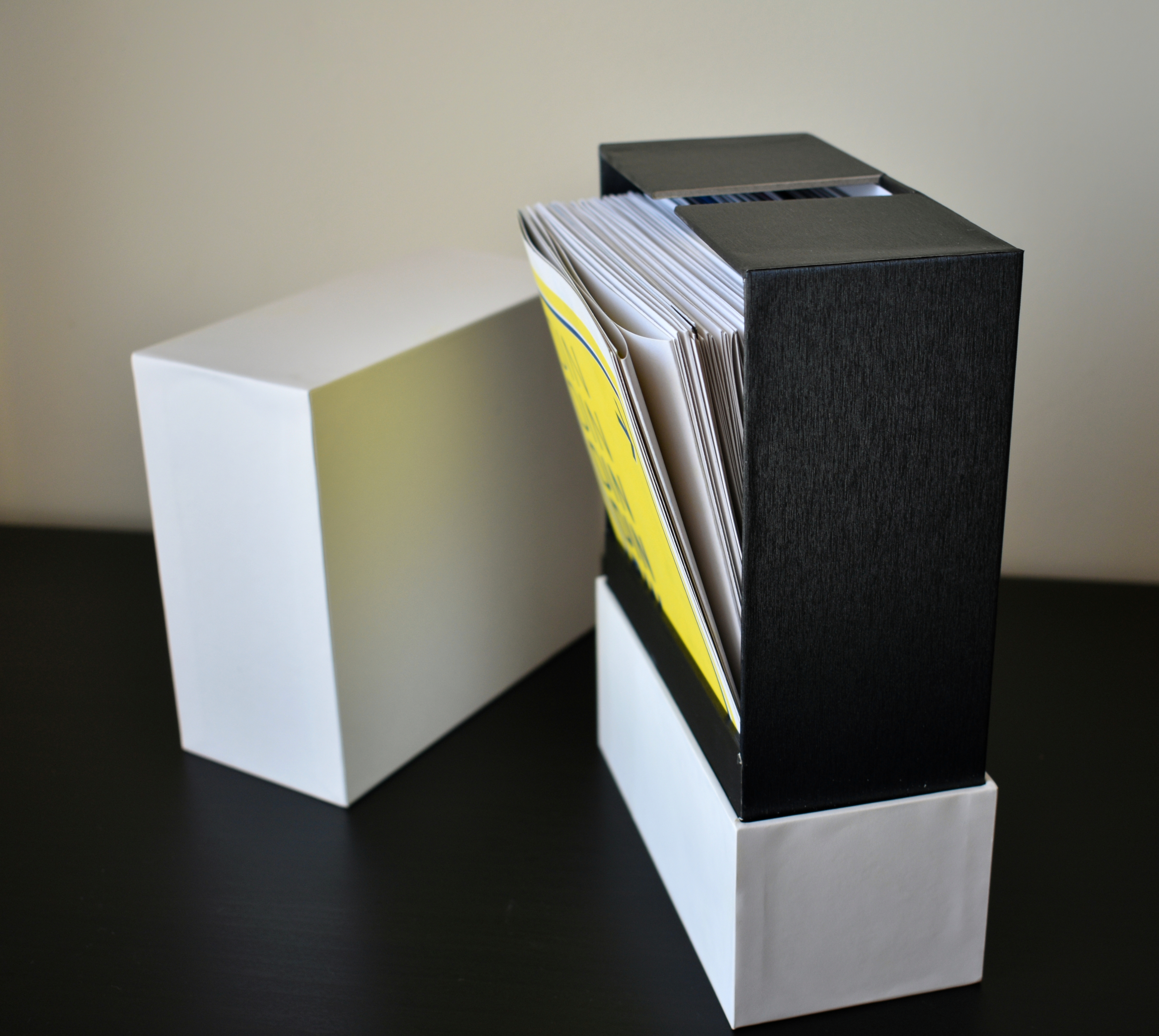 Anders brand wordmark in white placed on top of an image of a modern interior design.