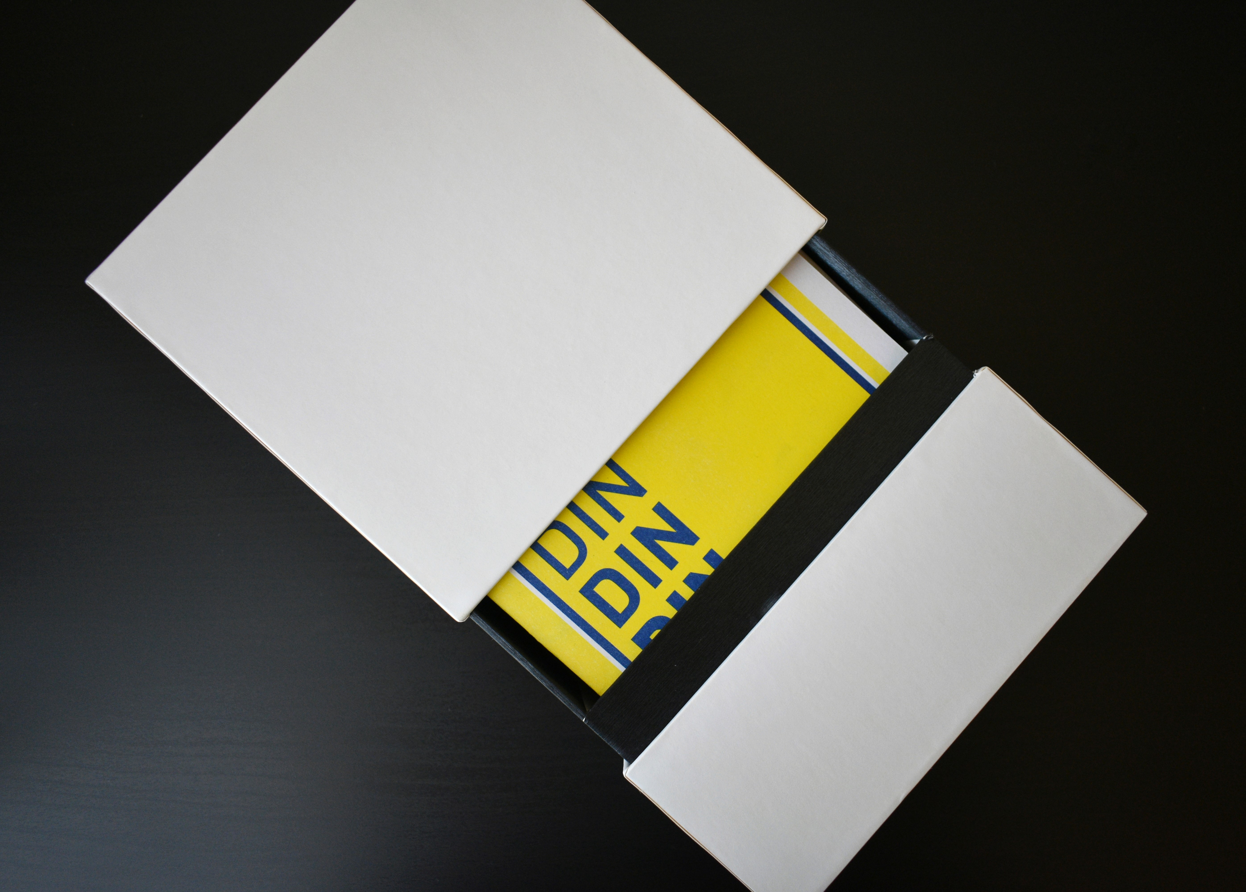 Anders brand wordmark in white placed on top of an image of a modern interior design.